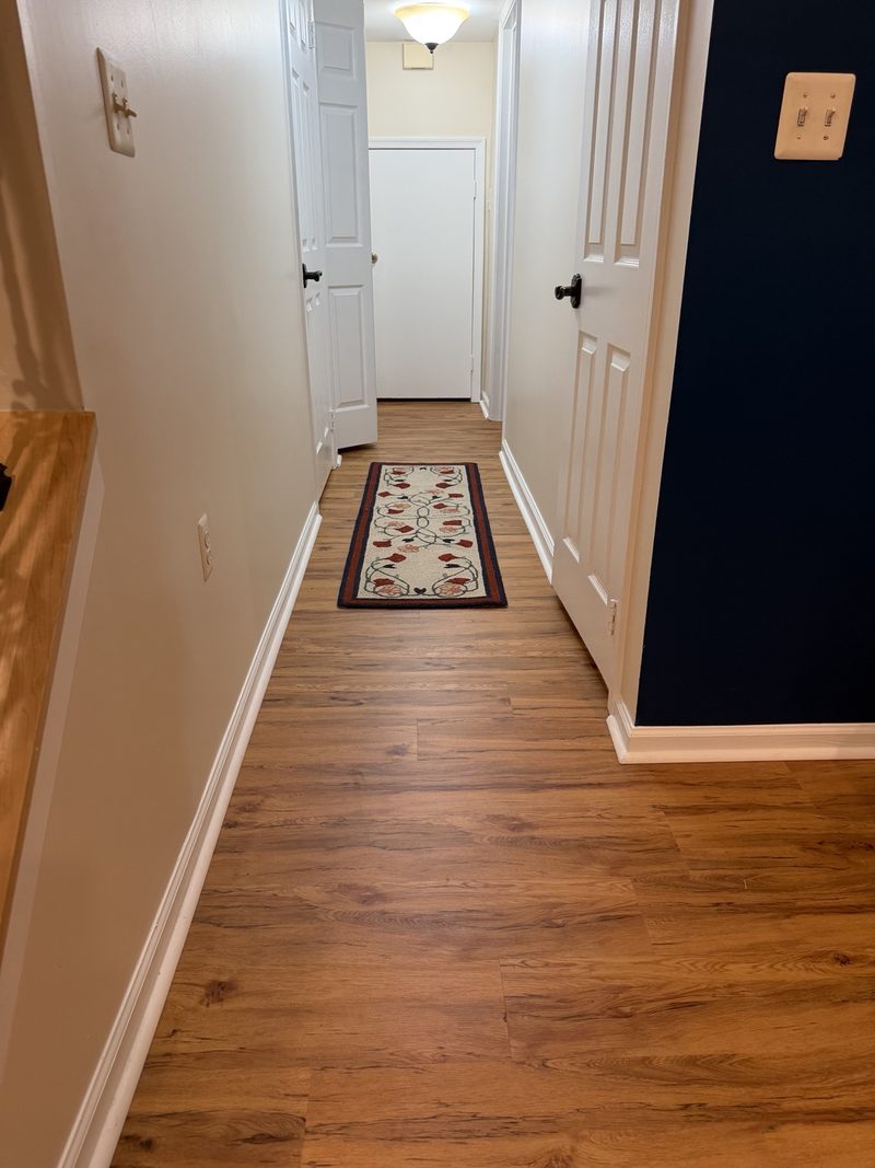 Finished flooring installation by Coastal Coatings, project 8
