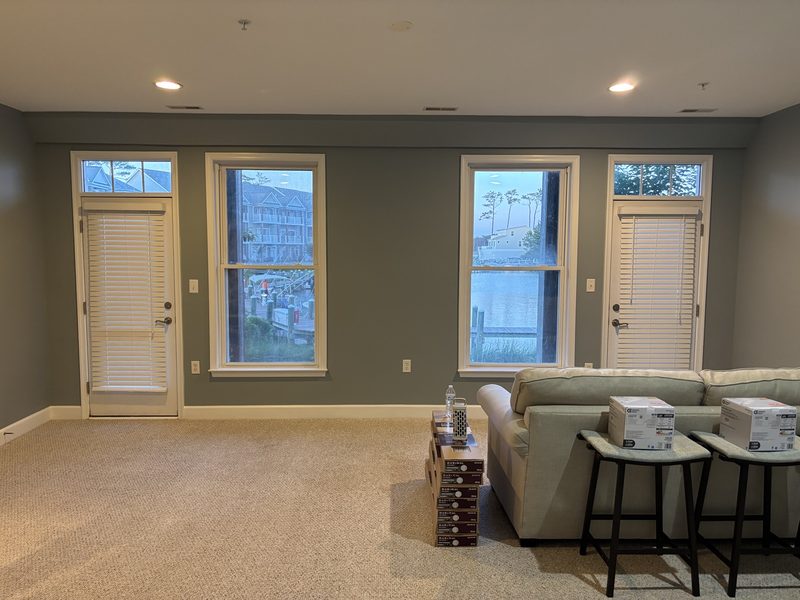Painted residential living area with trim and doors finished