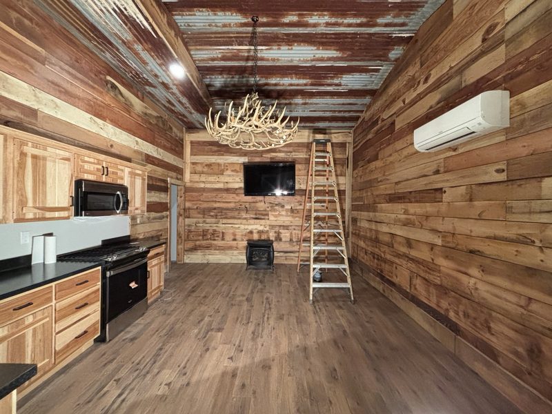 Barn interior finished with a clear coat over reclaimed timber walls and ceiling